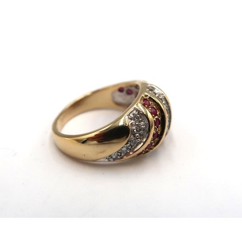 177 - A 9ct yellow gold ruby and diamond bombe ring, diamond and rubies are bright and lively, head size 2... 