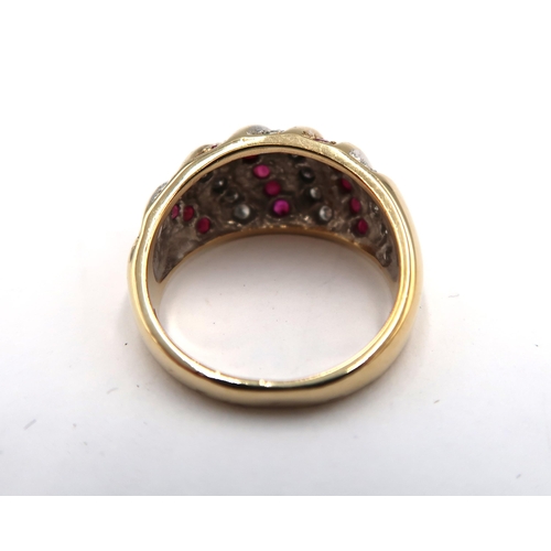 177 - A 9ct yellow gold ruby and diamond bombe ring, diamond and rubies are bright and lively, head size 2... 