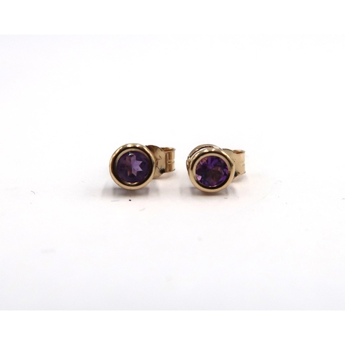 180 - A 9ct yellow gold amethyst stud earrings with 9ct backs, head size approx 5mm diameter