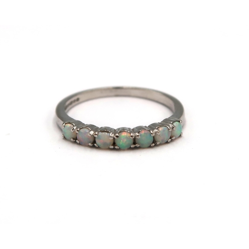 181 - An 18ct white gold seven stone opal ring, opals are a good colour and well matched, head size approx... 