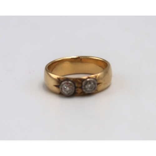 183 - An 18ct and old cut diamond two stone ring, each diamond of approximately 0.125ct, unmarked, but tes... 