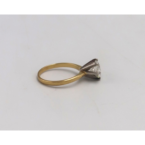 188 - An 18ct gold, platinum and diamond solitaire ring, the stone of approximately 1.5ct, size L/M, 3.1g.... 