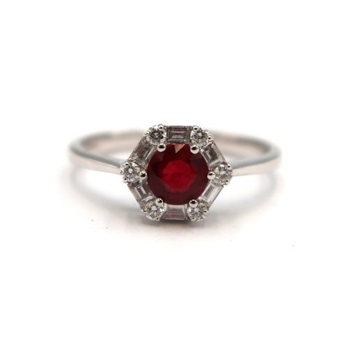 193 - An 18ct white gold quality ruby and diamond ring, pigeon blood ruby is a very good colour, diamonds ... 