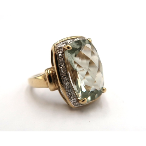 200 - A 9ct yellow gold green quartz (prasiolite) and diamond ring, head size approx 19mm x 15mm, sixe L/M