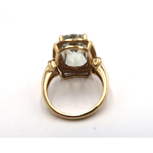 200 - A 9ct yellow gold green quartz (prasiolite) and diamond ring, head size approx 19mm x 15mm, sixe L/M