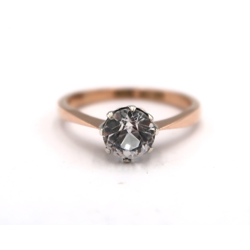 202 - A 9ct yellow gold white topaz solitaire ring, approx 1ct, head size approx 7mm diameter, size M