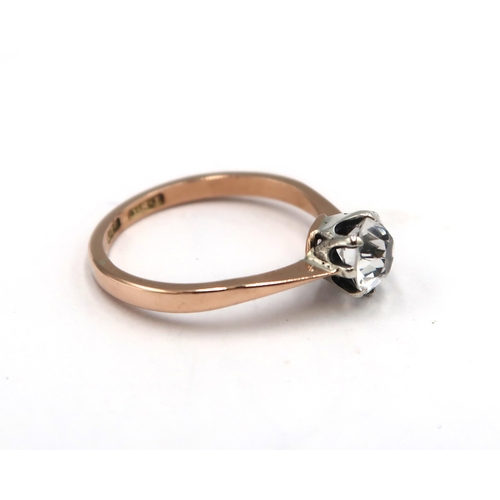 202 - A 9ct yellow gold white topaz solitaire ring, approx 1ct, head size approx 7mm diameter, size M