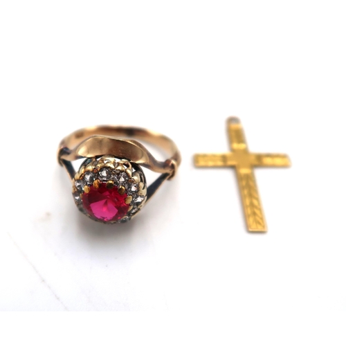 206 - A 9ct gold marked yellow gold dress ring size I-J - approx weight 3.2 grams - and a 9ct crucifix - a... 