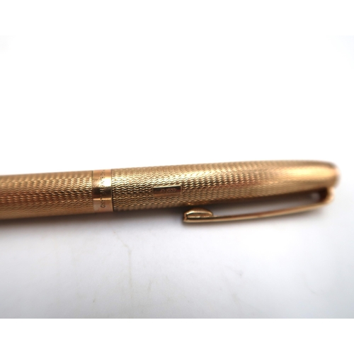 208 - A 9ct yellow gold ball point pen - approx total weight 22 grams