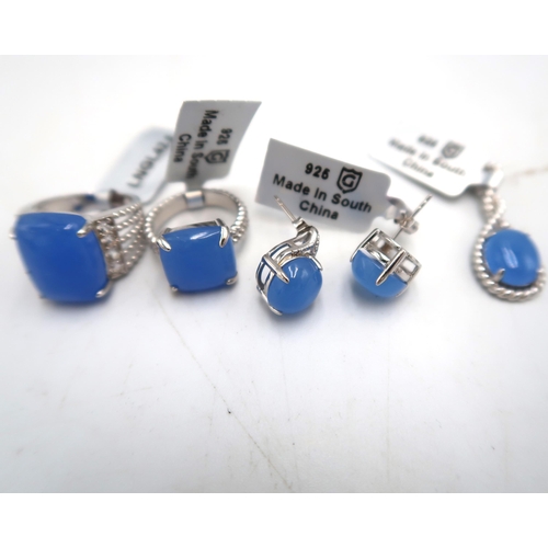 220 - A group of blue jade silver jewellery to include a pendant, a pair of earrings, a ring size J 1/2, a... 