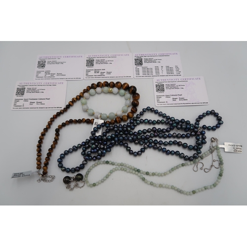 227 - A group of bead and cultured pearl jewellery. To a three row freshwater cultured pearl necklace, a p... 