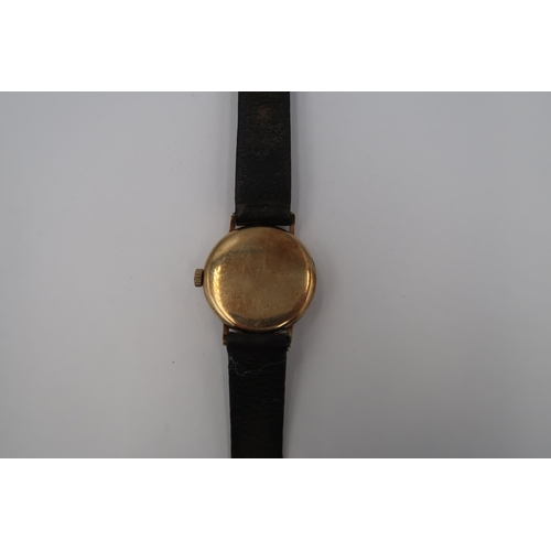 253 - A 9ct gold cased gentleman's Winegartens of London EC2 wristwatch, the signed Champagne dial with Ar... 