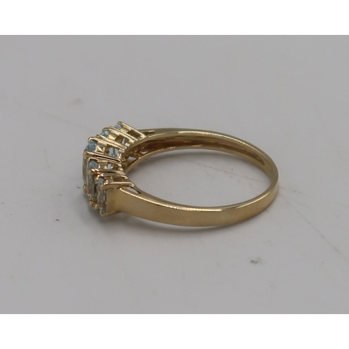 26 - A 9ct gold five stone dress ring, size T, marked .375, approx weight 2.6g.