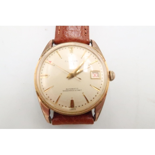 263 - A gents Clinton 110 vintage wristwatch with date aperture on a brown leather strap in good condition... 