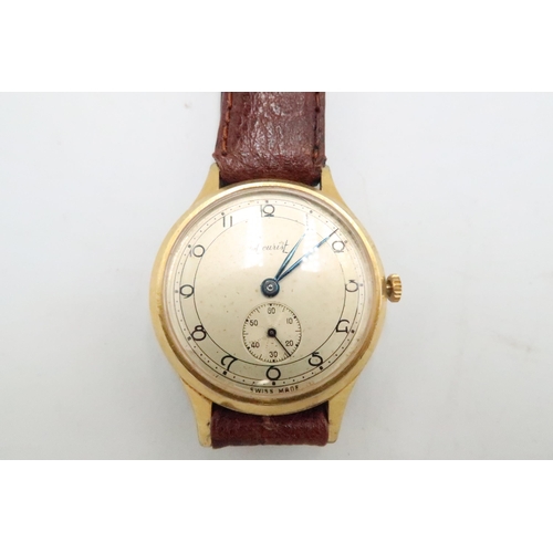 265 - An Accurist vintage wristwatch - in working order - on a brown leather strap