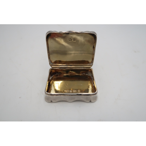 329 - A H.M. Silver and gilt lined pill box, Birmingham 1900, 1.59 Troy Oz monogrammed to top with foliate... 