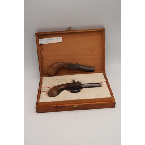 431 - A 19th century Percussion pistol and one other French Percussion cap pistol