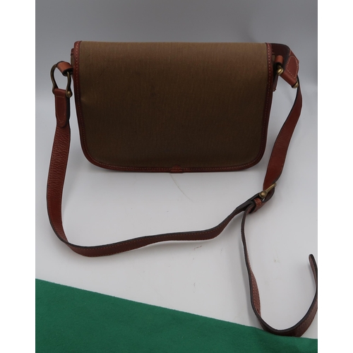 453 - A Mulberry shoulder bag, of classic cartridge bag form, in vinyl and leather, 28 by 29 by 8cm deep, ... 