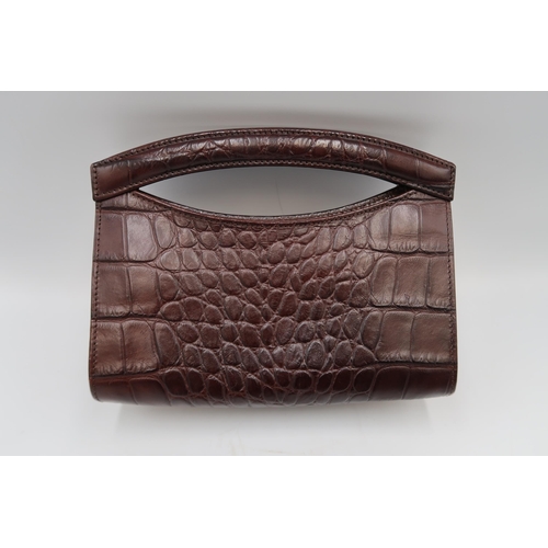 455 - A Mulberry leather handbag, or clutch bag, with crocodile texture to the matt brown leather, 17 by 2... 