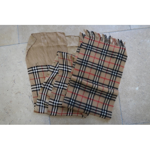 456 - A lady's Burberry double breasted rain or trench coat, size 12, complete with liner and scarf, and a... 