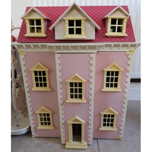 458 - A pink finished Georgian style doll's house with furniture and accessories.