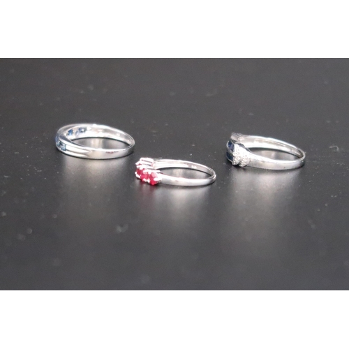 51 - Three 9ct white gold dress rings, one set with seven round cut sapphires, size T, 2.4g, one set with... 