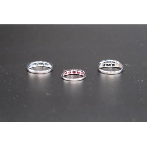 51 - Three 9ct white gold dress rings, one set with seven round cut sapphires, size T, 2.4g, one set with... 