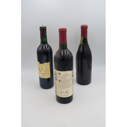 531 - A 1983 75cl bottle of Volnay, A 1990 Chateau De La Tour and a 1978 Fetzer.