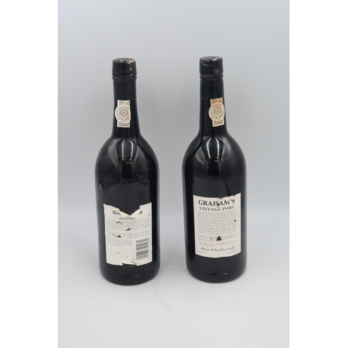 537 - a 75CL bottle of Grahams Vintage Port 1983, a 1986 75cl bottle of Grahams Malvedos port