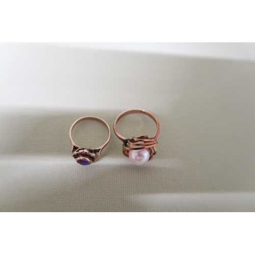 61 - Two 14ct gold dress rings, comprising a rose gold and pearl dress ring, size M, 3.4g and an amethyst... 