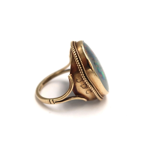 82 - A 9ct H.M. yellow gold and opal dress ring 5.8grams, Size L