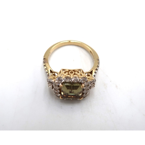 86A - A Kallati, 14ct gold, diamond and zultanite dress ring, the large emerald cut zultanite bordered by ... 