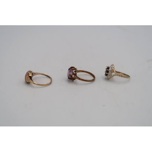 87 - Three 9ct H.M. yellow gold rings, one with sapphire to shoulder, one with amethyst and one with opal... 