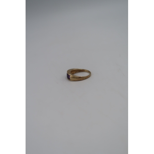 91 - A 9ct gold five stone ring, the emerald cut stones in a channel setting, size T, marked .375, 4.0g.