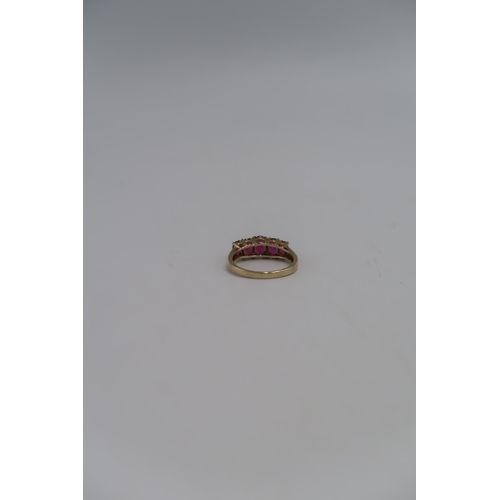 93 - A 9ct gold dress ring, set with five oval cut purple stones,  size R, 3.0g.