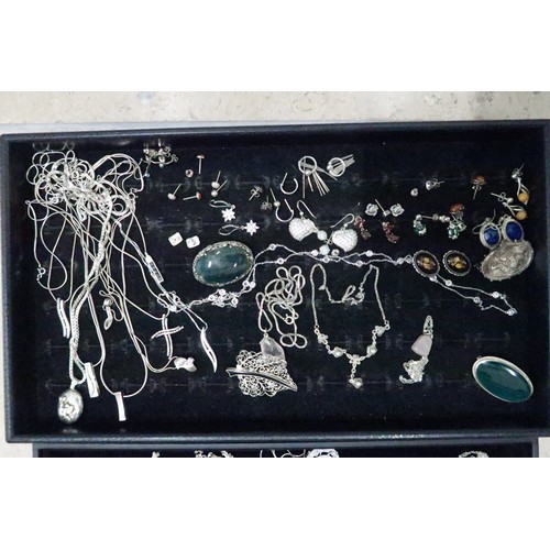 245 - A large group of costume and silver jewellery including some silver and moonstone, amethyst set jewe... 