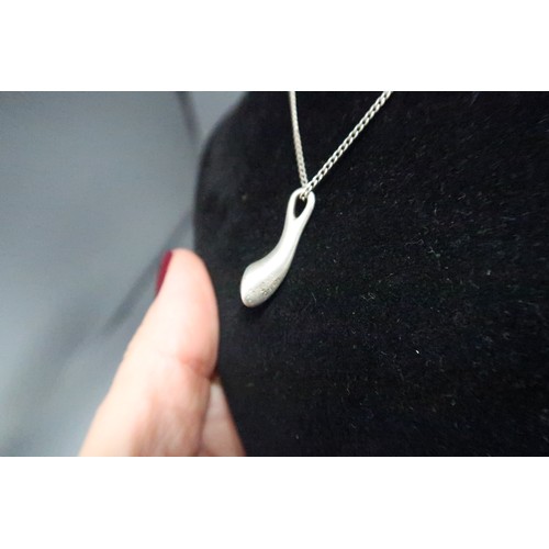 245A - A Georg Jensen Carnival pendant with Onyx - pendant drop 23mm - chain length 46cm - abrasions to bot... 