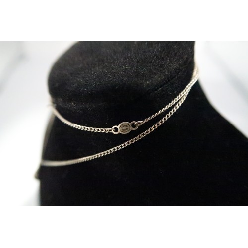 245A - A Georg Jensen Carnival pendant with Onyx - pendant drop 23mm - chain length 46cm - abrasions to bot... 