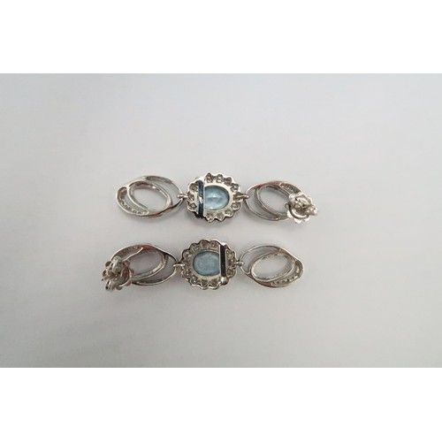 1 - A pair of aquamarine and diamond ear pendants. Estimated total diamond weight 0.80ct. Length 45mm. W... 