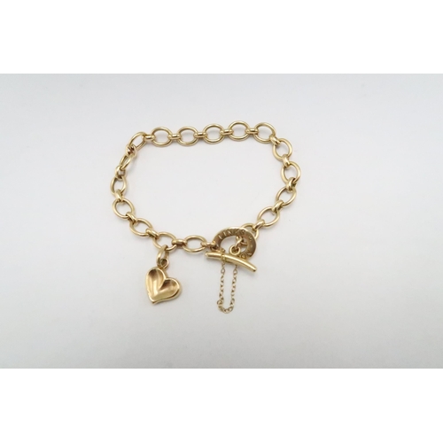 1 - LINKS OF LONDON - An 18ct gold ladies charm bracelet with heart charm - approx length 19cm - approx ... 