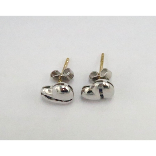 130 - A pair of marked 750 white gold heart shaped diamond and sapphire earrings - approx weight 3.6 grams