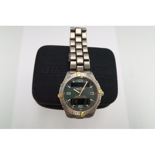 254 - A gentleman's Breitling Aerospace, titanium quartz wristwatch, with digital and analogue green dial,... 