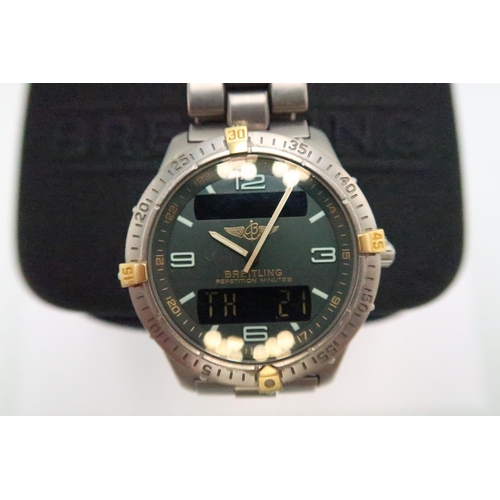 254 - A gentleman's Breitling Aerospace, titanium quartz wristwatch, with digital and analogue green dial,... 