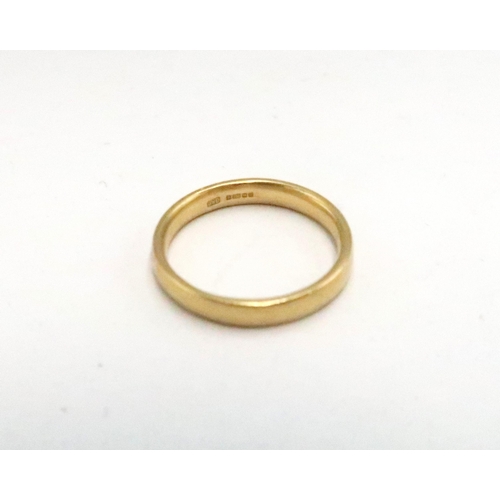 5 - An 18ct yellow gold hallmarked wedding band size L - approx weight 3 grams