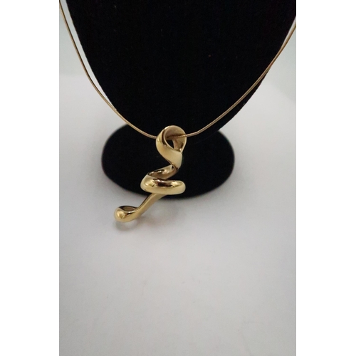 53 - A 14ct yellow gold necklace and pendant - approx weight 4.5 grams