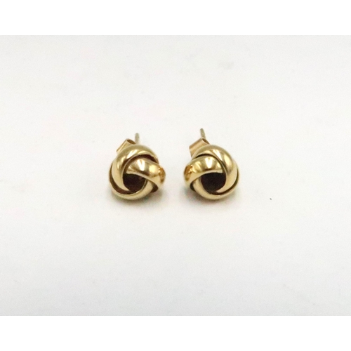 7 - A pair of 18ct gold hallmarked knot earrings - approx weight 5.7 grams