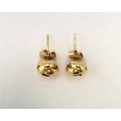 7 - A pair of 18ct gold hallmarked knot earrings - approx weight 5.7 grams