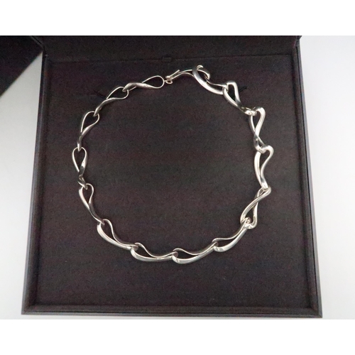 2 - A Georg Jensen hallmarked Silver 452 Infinity necklace 43.5cm long, Boxed as new condition.