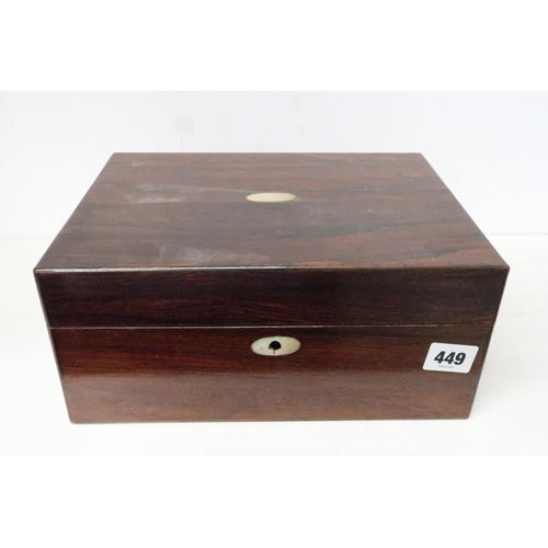 449 - A 19th century rosewood travelling vanity case with fitted interior and mother of pearl to lock, 27c... 