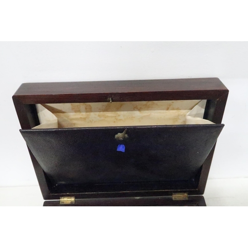 449 - A 19th century rosewood travelling vanity case with fitted interior and mother of pearl to lock, 27c... 